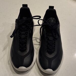 Sleek Black Athletic Shoes for Men some bleeding  on white sides see pictures